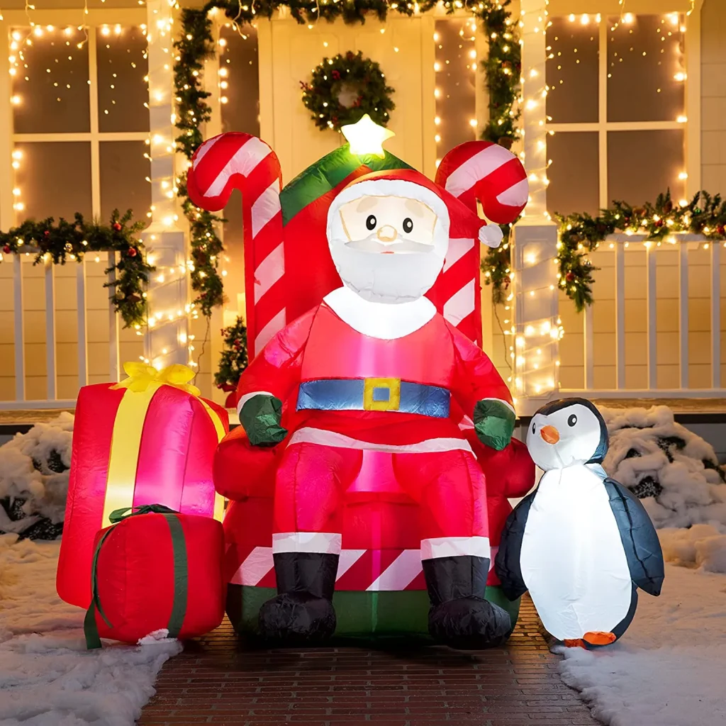 Large santa on candy throne with penguin