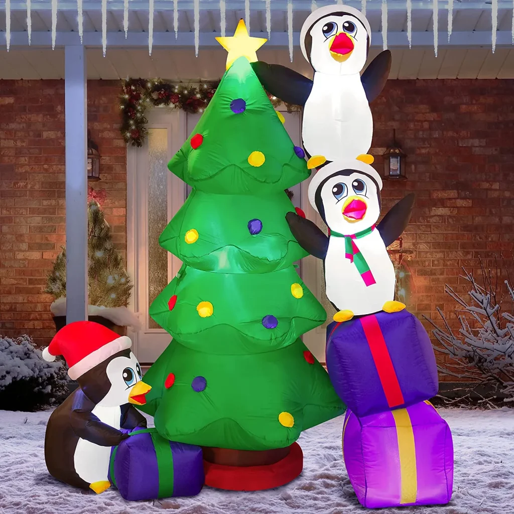 Inflatable penguins decorating tree