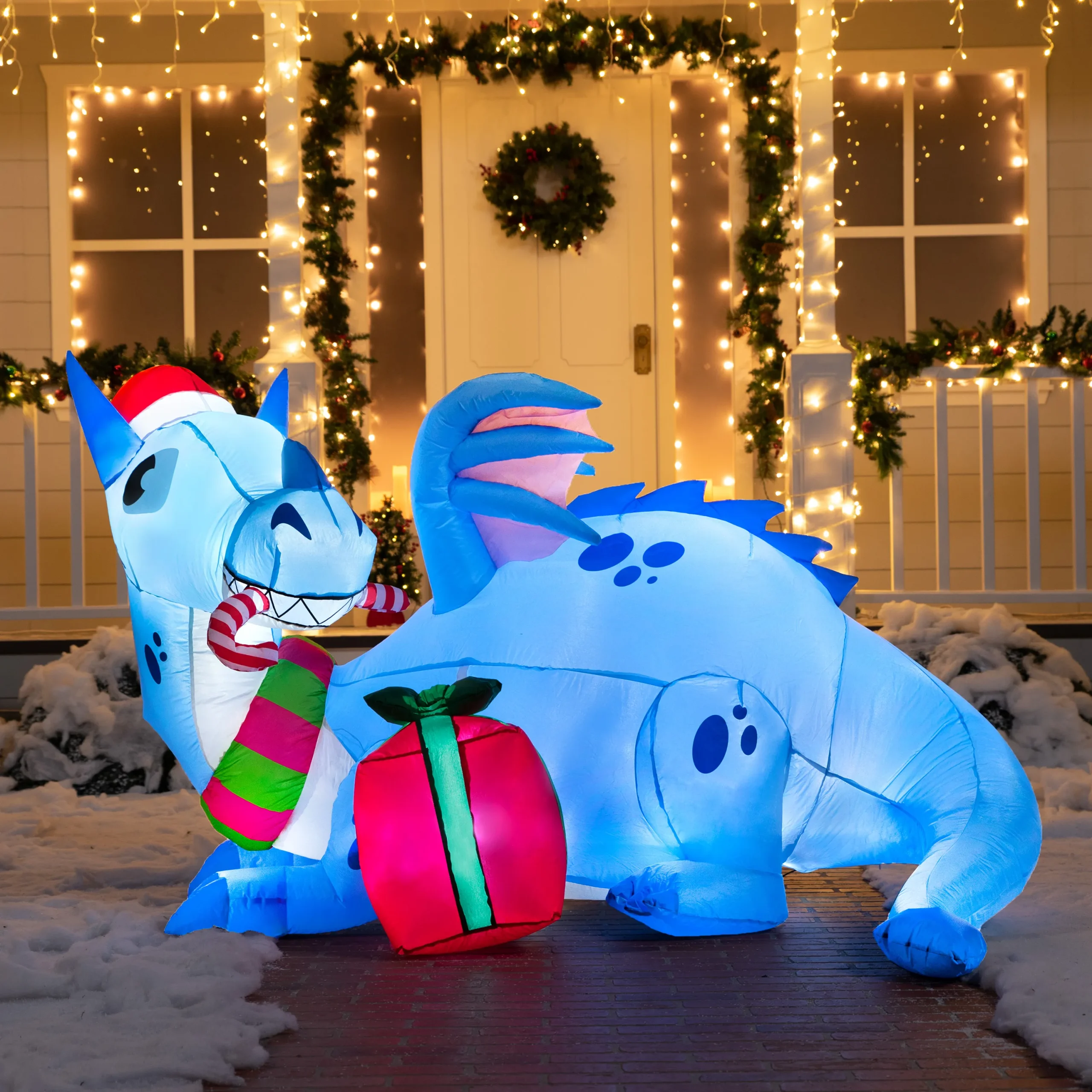 Blue christmas dragon inflatable guarding gift smile