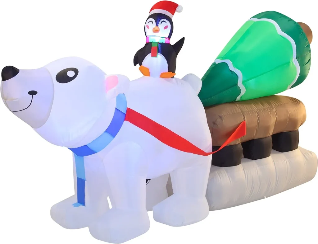 Christmas penguin inflatable riding a polar bear