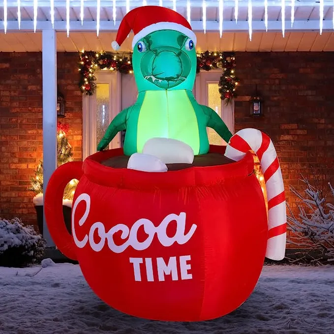 Christmas dinosaur inflatable in a huge mug