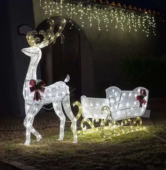 Lighted reindeer with sleigh decor